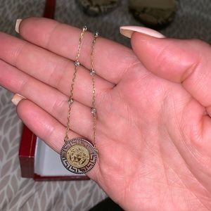 Gold necklace versace
